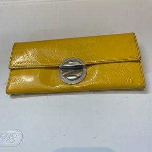 Smooth leather Prada wallet.